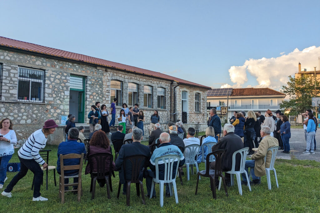 The team presenting their work to the local community at the end of the May workshop, Greek cycle. 