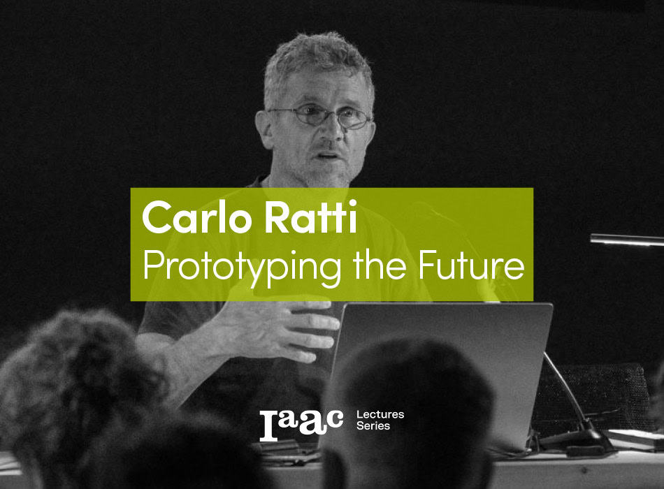 A black and white image of Carlo Ratti speaking during a lecture about urban design and future city prototypes, emphasizing innovation, architecture, and urban development.